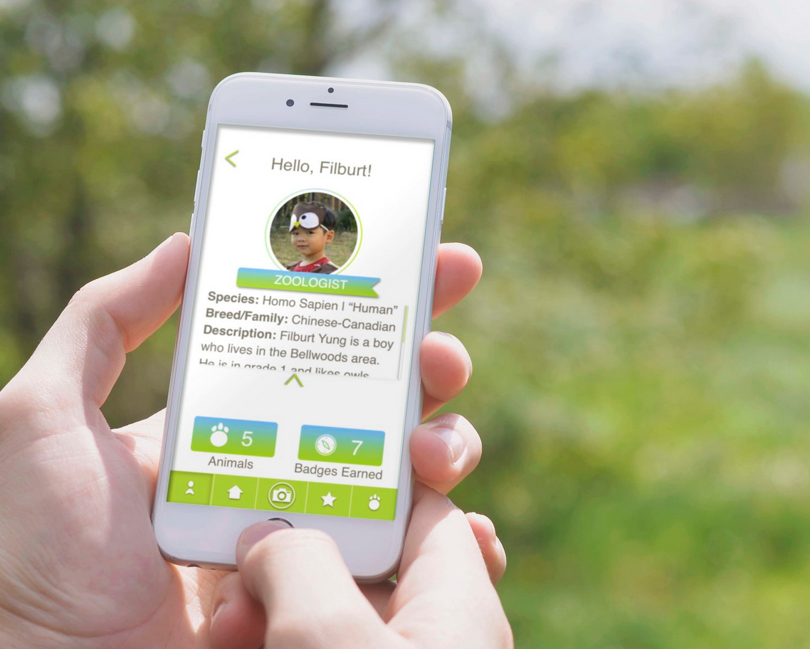 Image of the Zoolog app being used outdoors by a child.